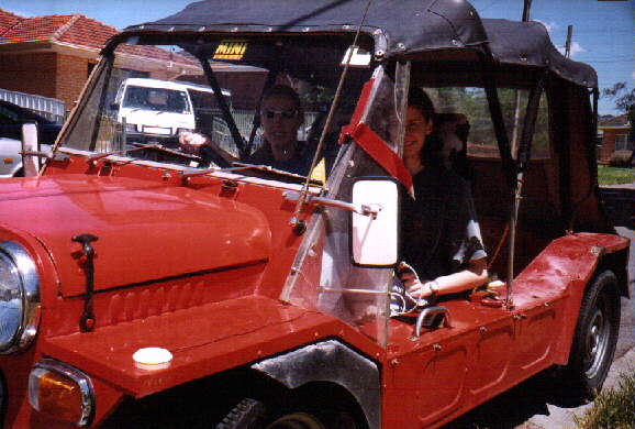 Gemma (left) and friend in her Moke.